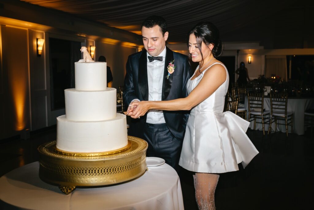 cake cutting at The Lake House Inn by Emily Wren Photography