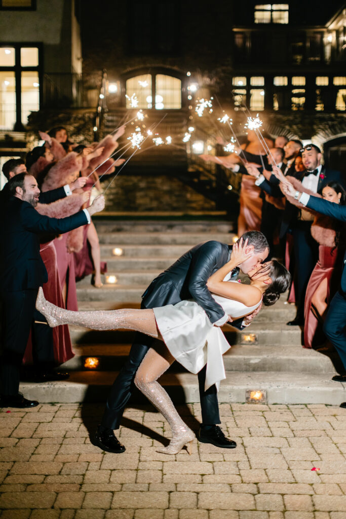 bride and groom wedding reception sparkler exit at The Lake House Inn by Emily Wren Photography