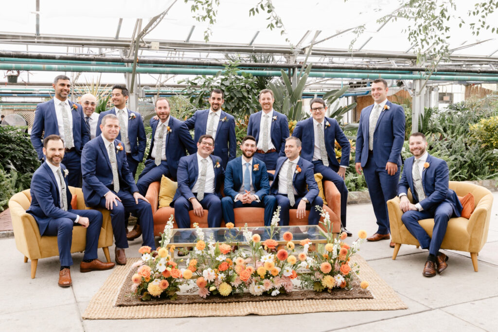 groom with groomsmen dressed in blue tux's for colorful fall Philadelphia wedding day