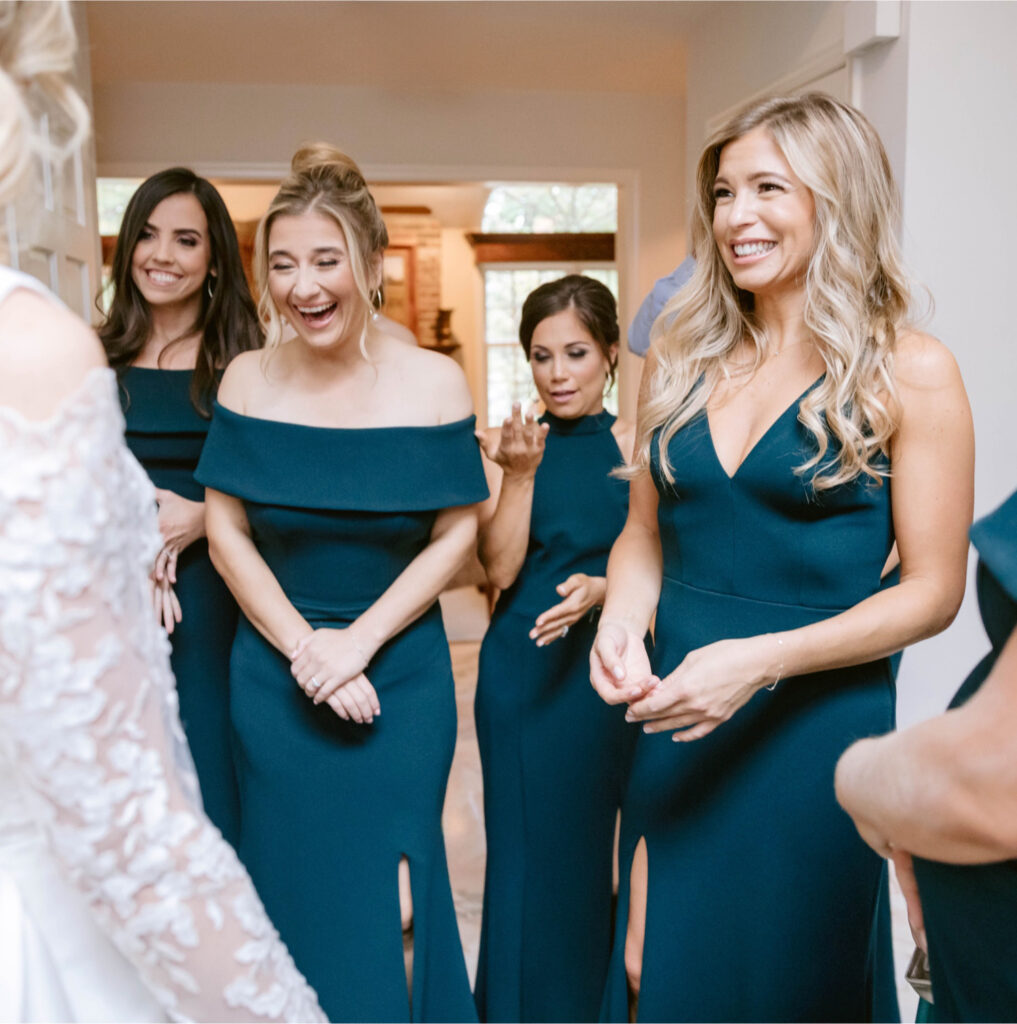 bride's first look with bridesmaids