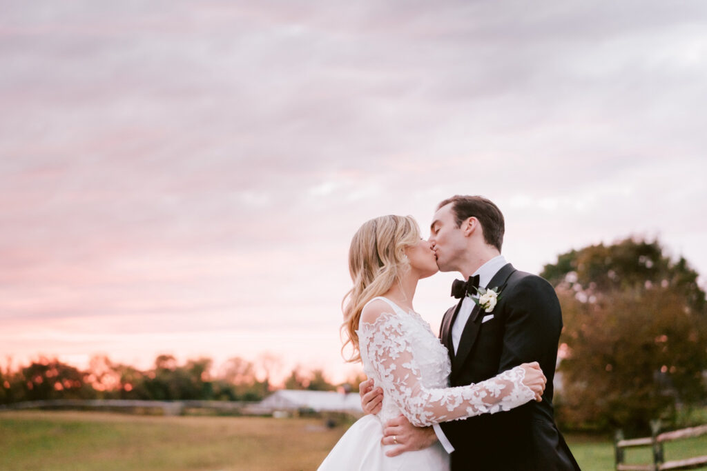 bride & groom during sunset at Radnor Hunt Country Club in New Jersey by Emily Wren Photography