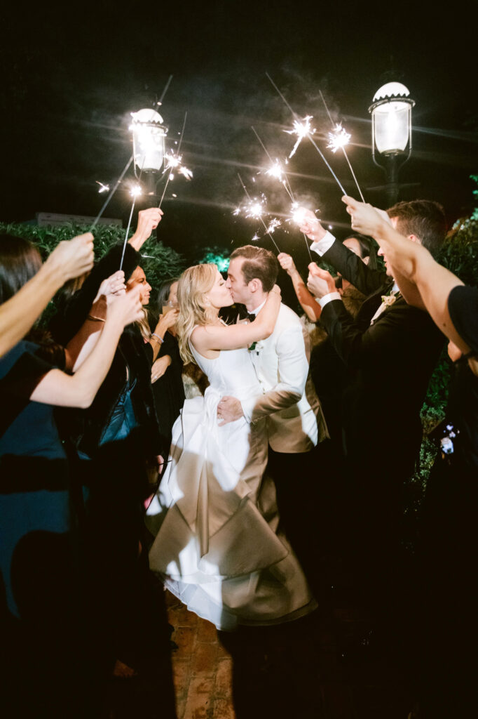 bride & groom during sparkler exit at Radnor Hunt Country Club wedding reception in New Jersey by Emily Wren Photography