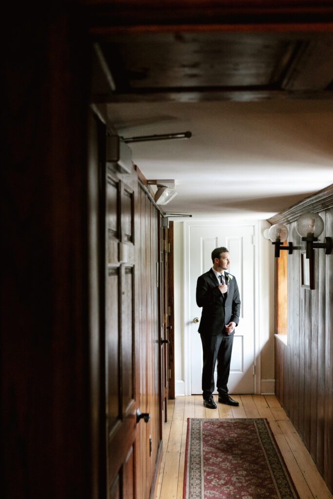 Groom getting ready by Emily Wren Photography