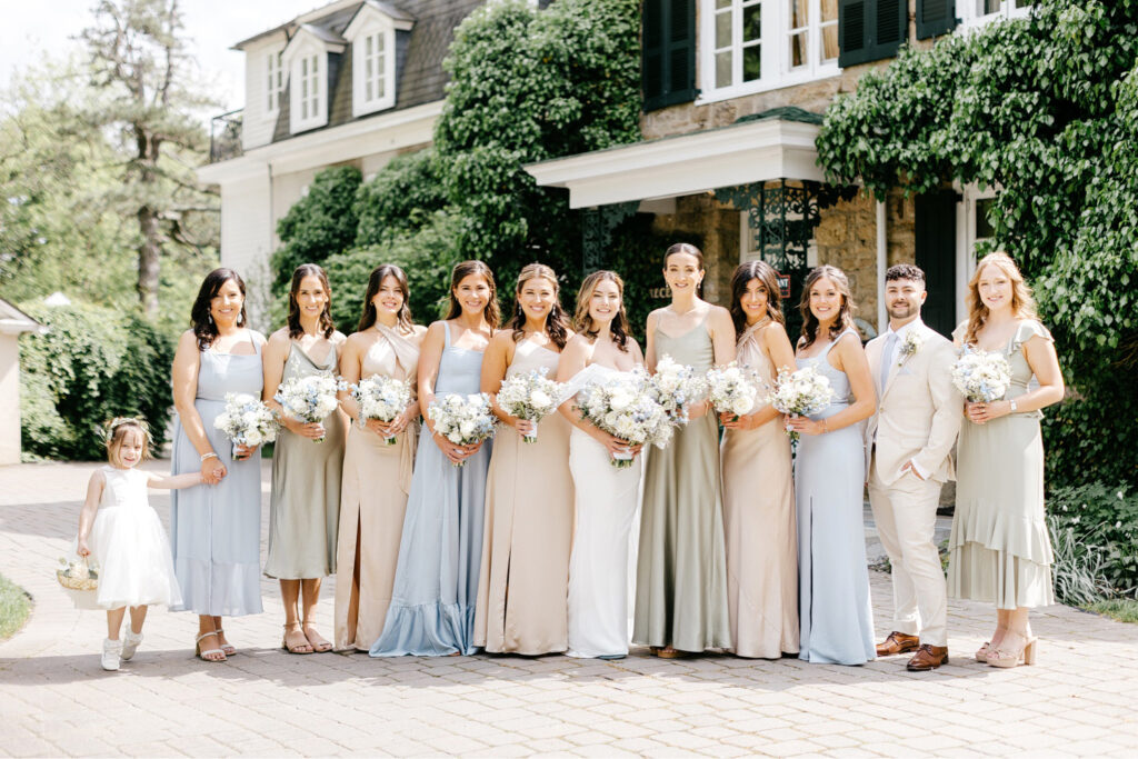 bride with her bridesmaids in mismatched bridesmaid dresses