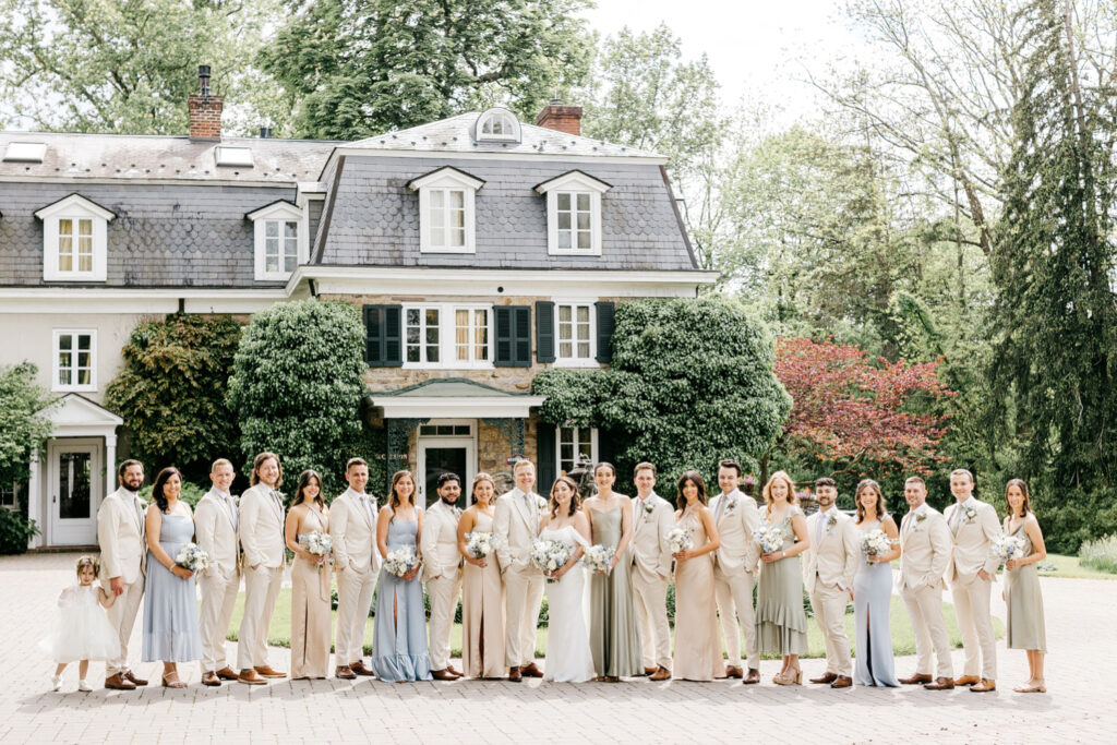 full wedding party dressed in neutral color palette by Emily Wren Photography