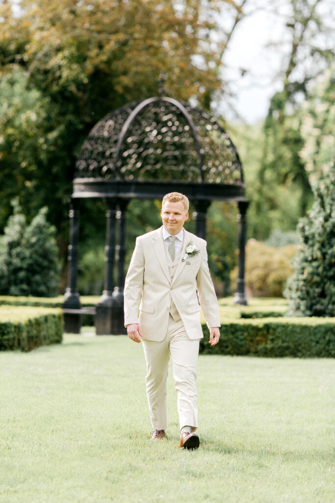 groom walking down the aisle at the inn at Barley Sheaf