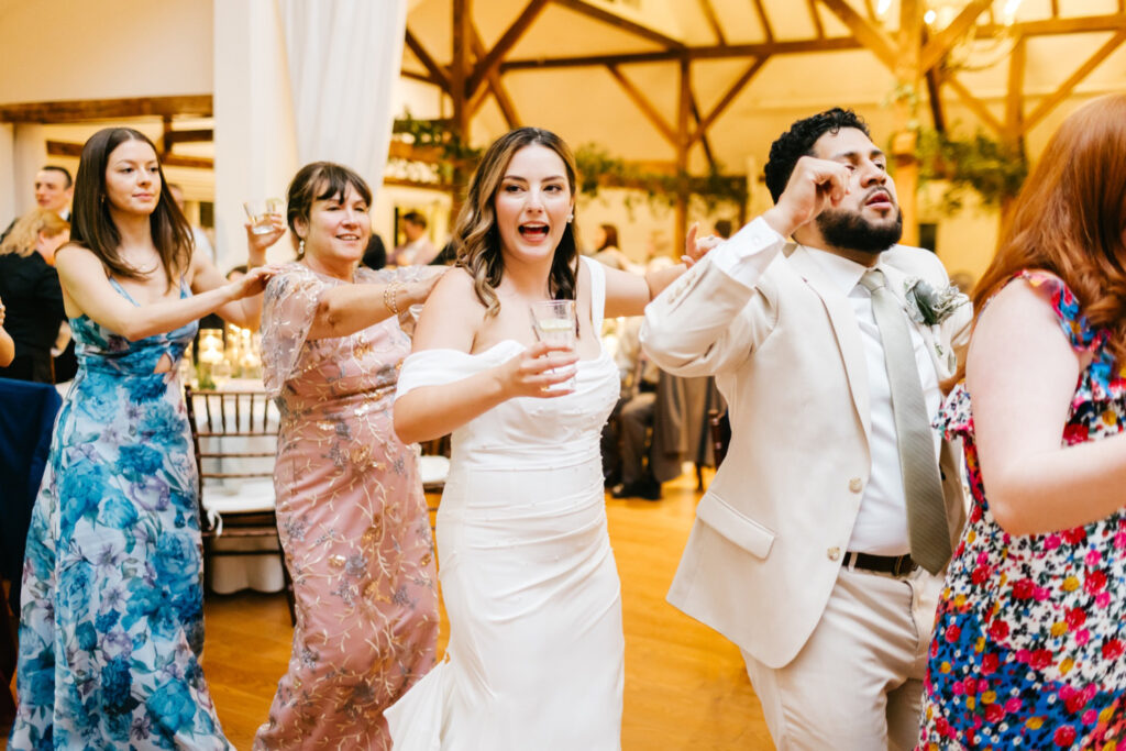 bride dancing at her wedding reception at the inn at barley sheaf