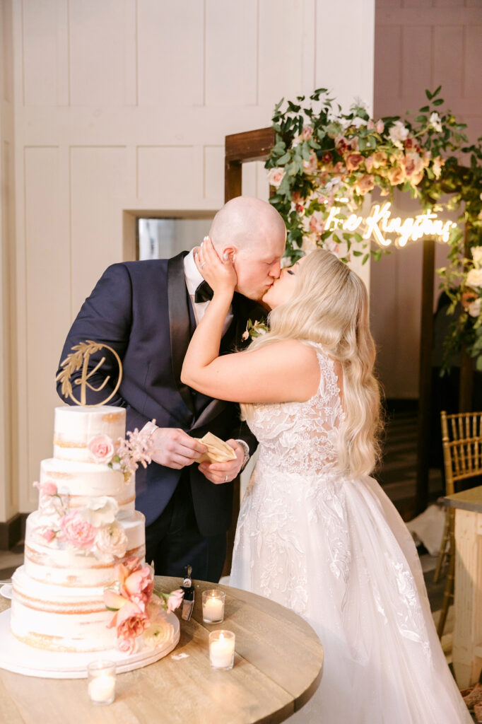 bride & groom cutting their naked wedding cake