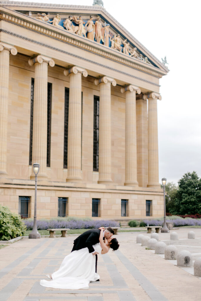 bride & groom at the Philadelphia Museum of Art by Emily Wren Photography