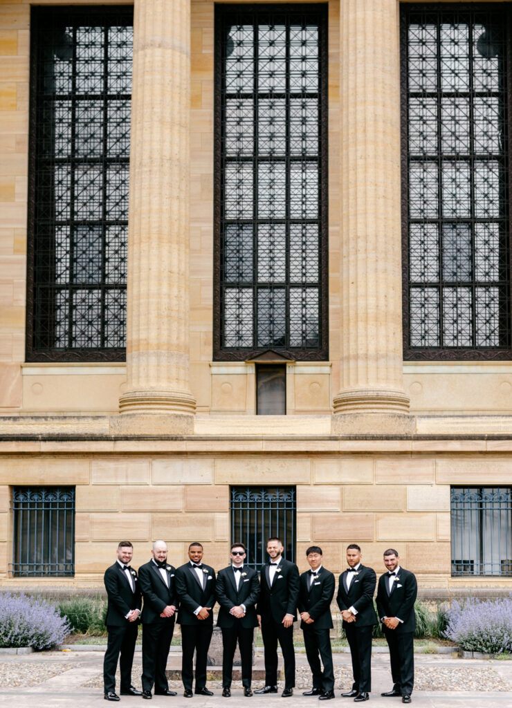 groom with groomsmen at art museum in Philadelphia