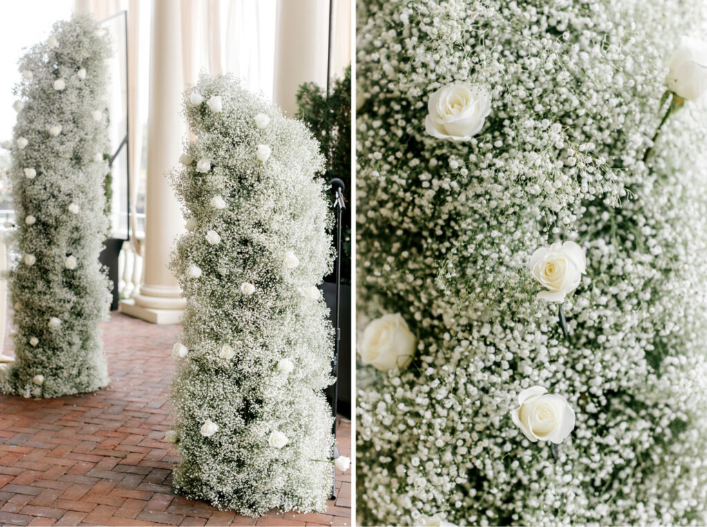 floral wedding ceremony arch with white roses and babies breath