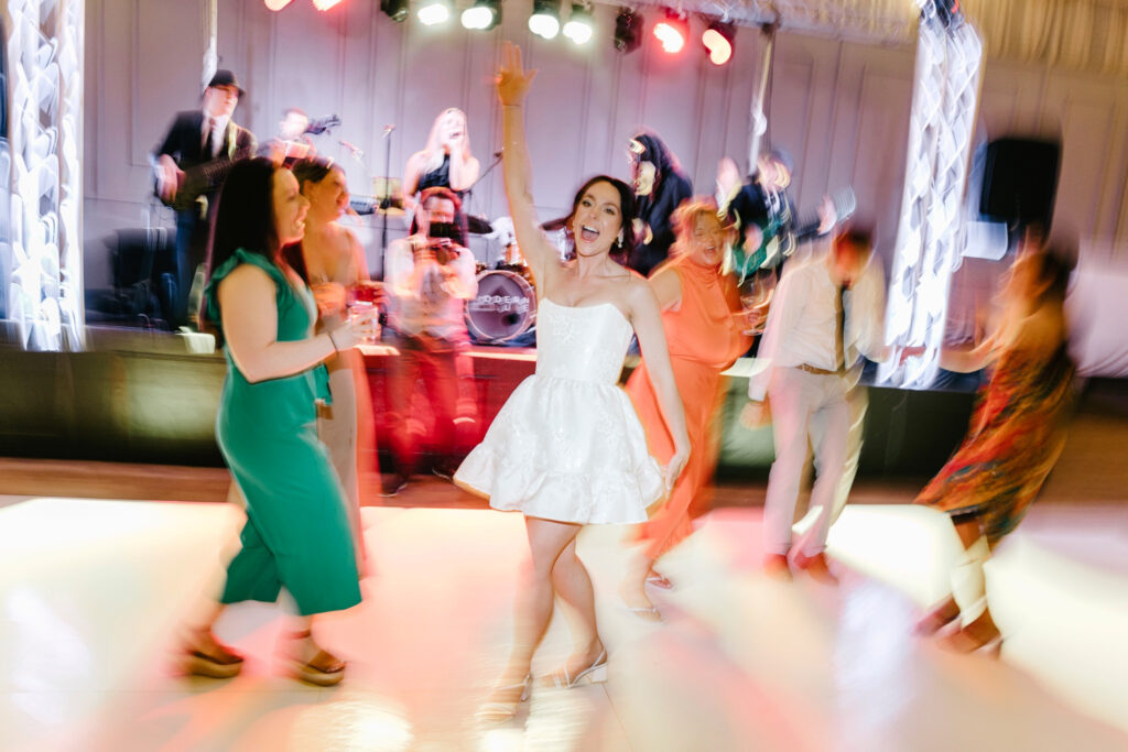 bride dancing at her Philadelphia Water Works wedding reception by Emily Wren Photography