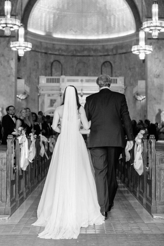 Philadelphia bride walking down church aisle at St Patricks Church