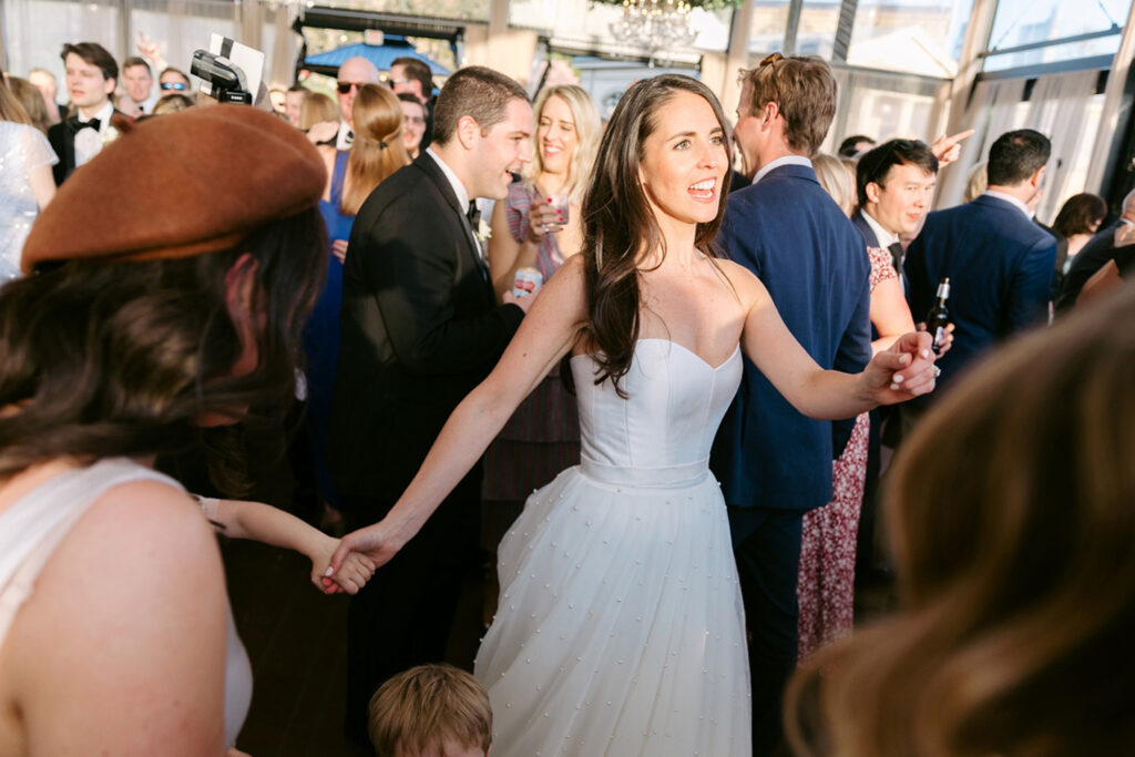 bride dancing & having fun at her Cescaphe wedding reception by Emily Wren Photography