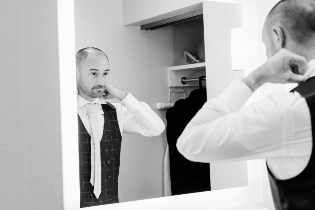 groom getting ready for his summer Pennsylvania wedding day by Emily Wren Photography