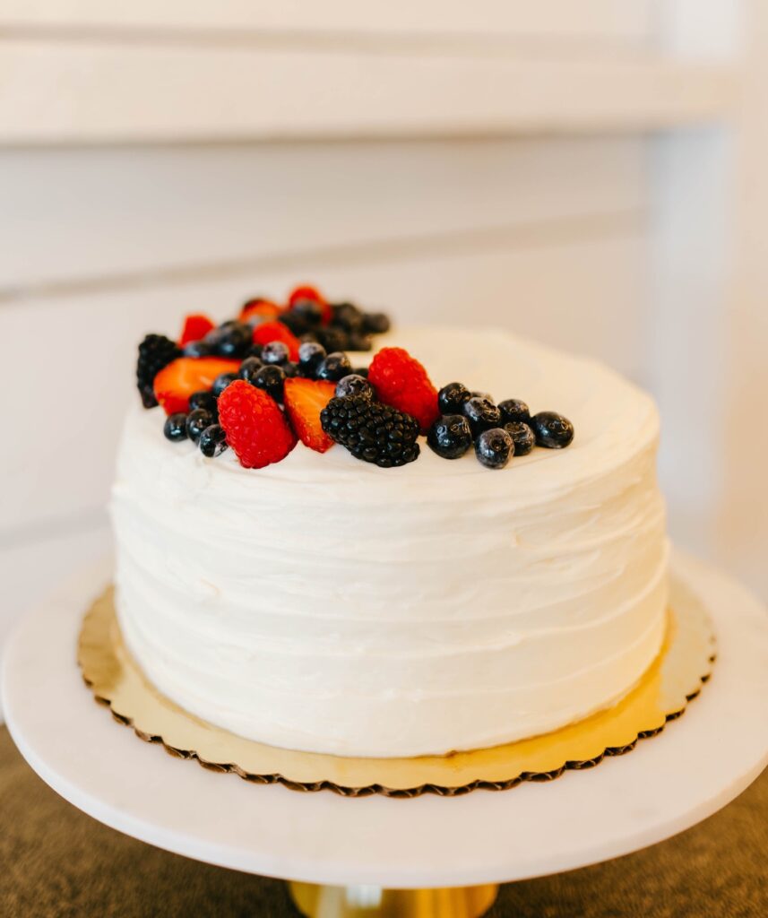 simple wedding cake with fruit topping