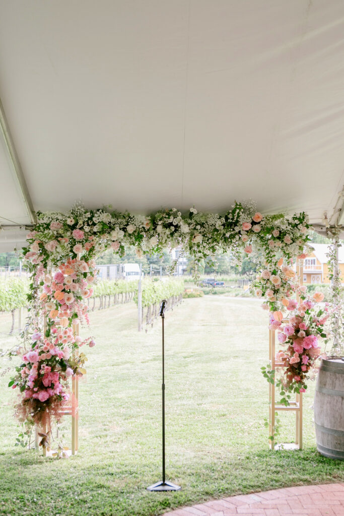 pink floral wedding arch for outdoor New Jersey summer wedding ceremony