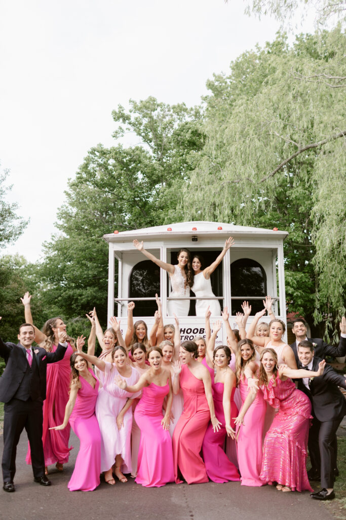 full bridal party on a trolley in Cape May New Jersey by Emily Wren Photography