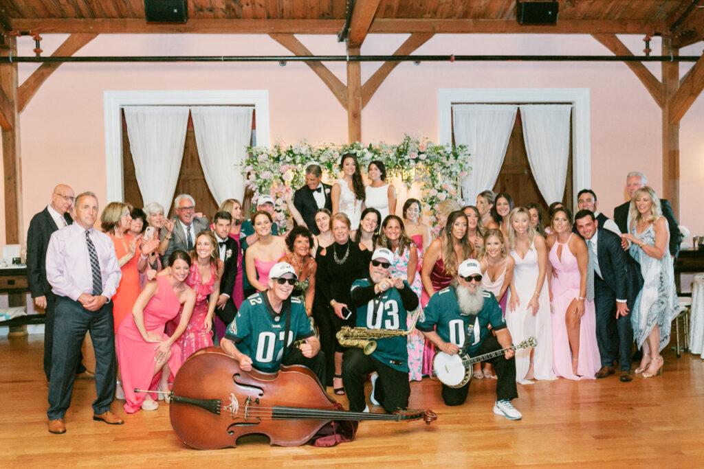 full wedding guests photo with Philadelphia Eagles wedding band