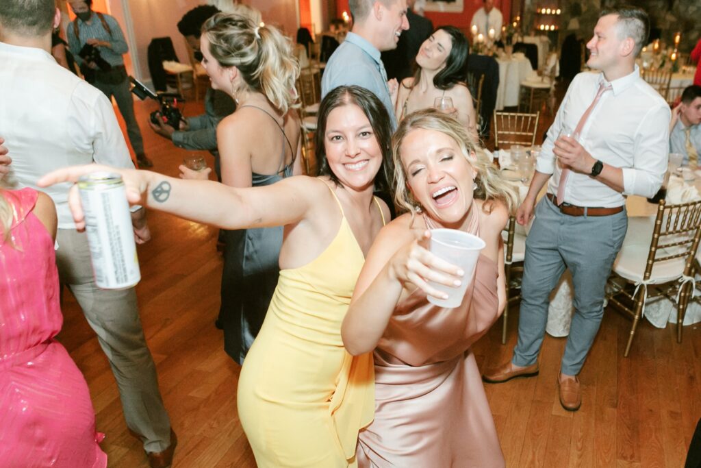 guests dancing at Willow Creek Winery wedding reception by Emily Wren Photography