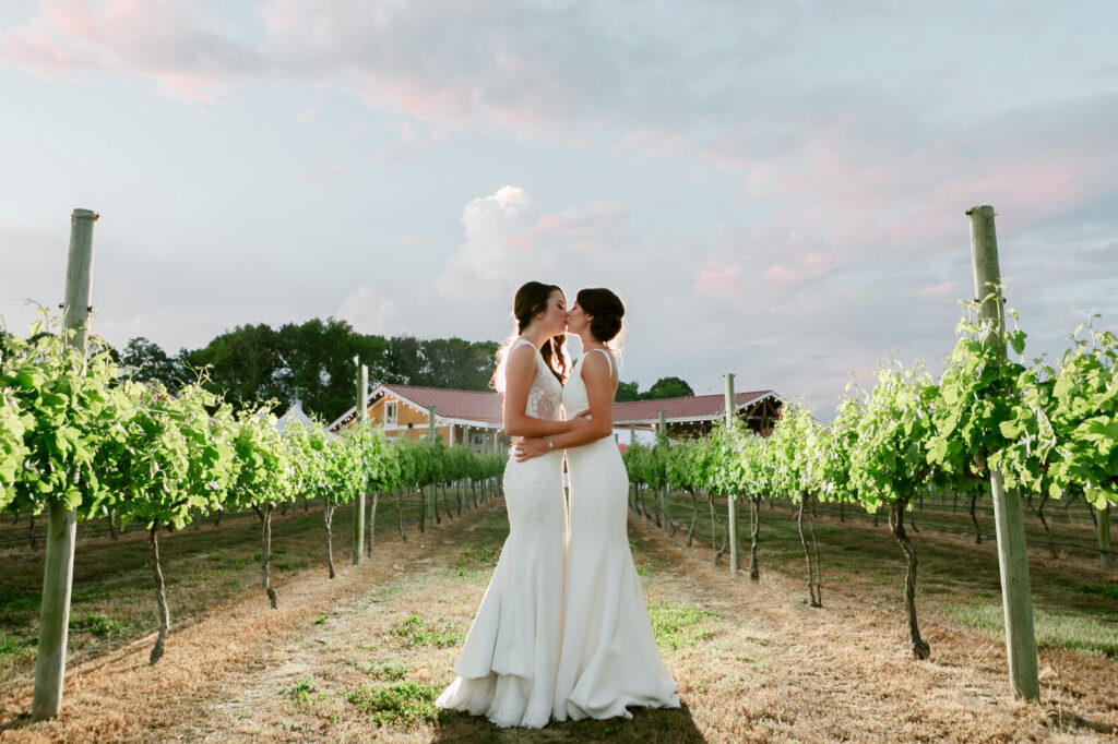 lesbian brides sunset portrait at Willow Creek Winery by Emily Wren Photography