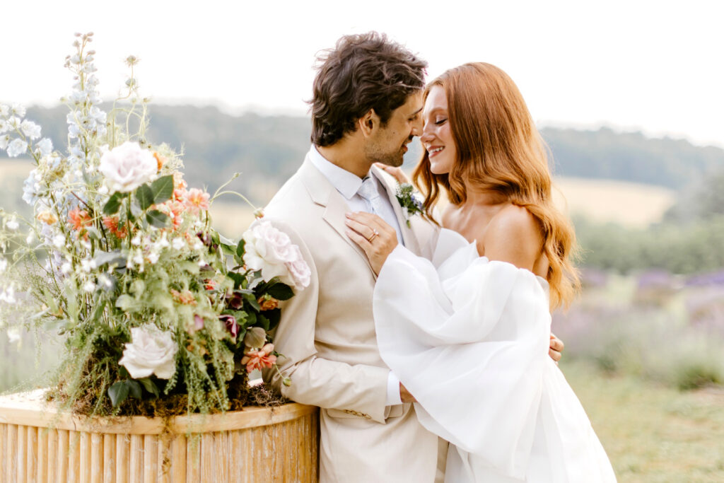 bride & groom portrait at outdoor bar by Emily Wren Photography