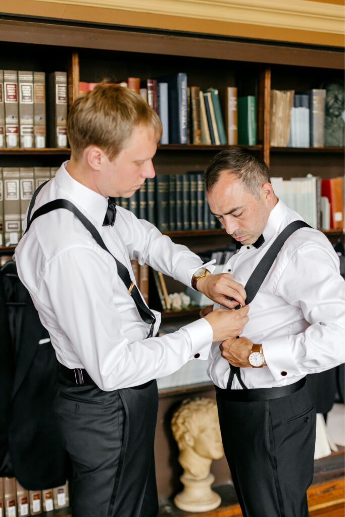 LGBTQ grooms getting ready together for their Philadelphia wedding by Emily Wren Photography