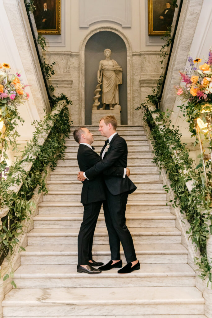 LGBTQ grooms at their College of Physicians wedding reception in Philadelphia by Emily Wren Photography