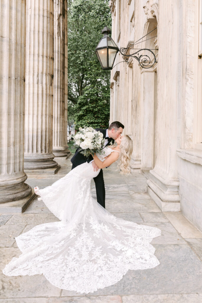 bride and groom at Second National Bank in Philadelphia by Emily Wren Photography