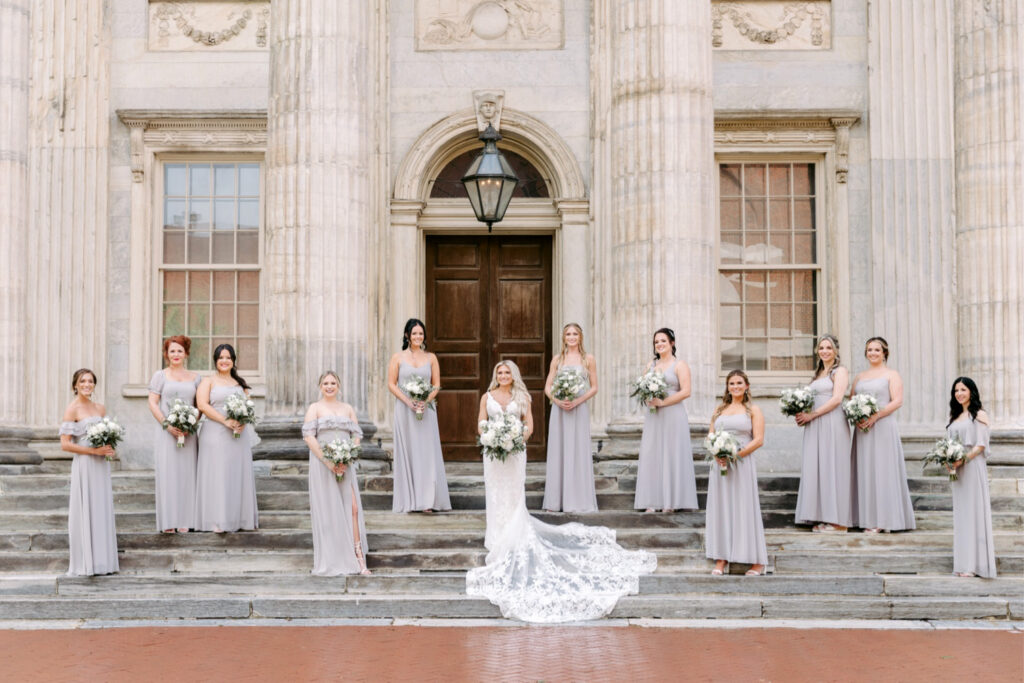 bride with her bridesmaids in sleet grey bridesmaid dresses at Second National Bank