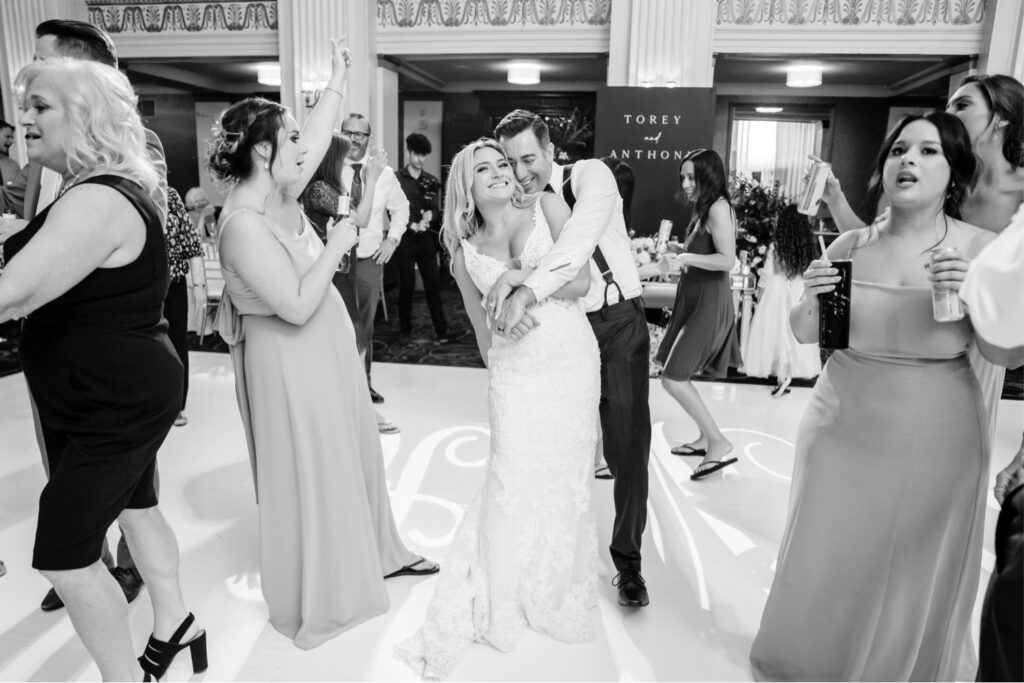 bride and groom dancing at their Cescaphe wedding reception by Emily Wren Photography