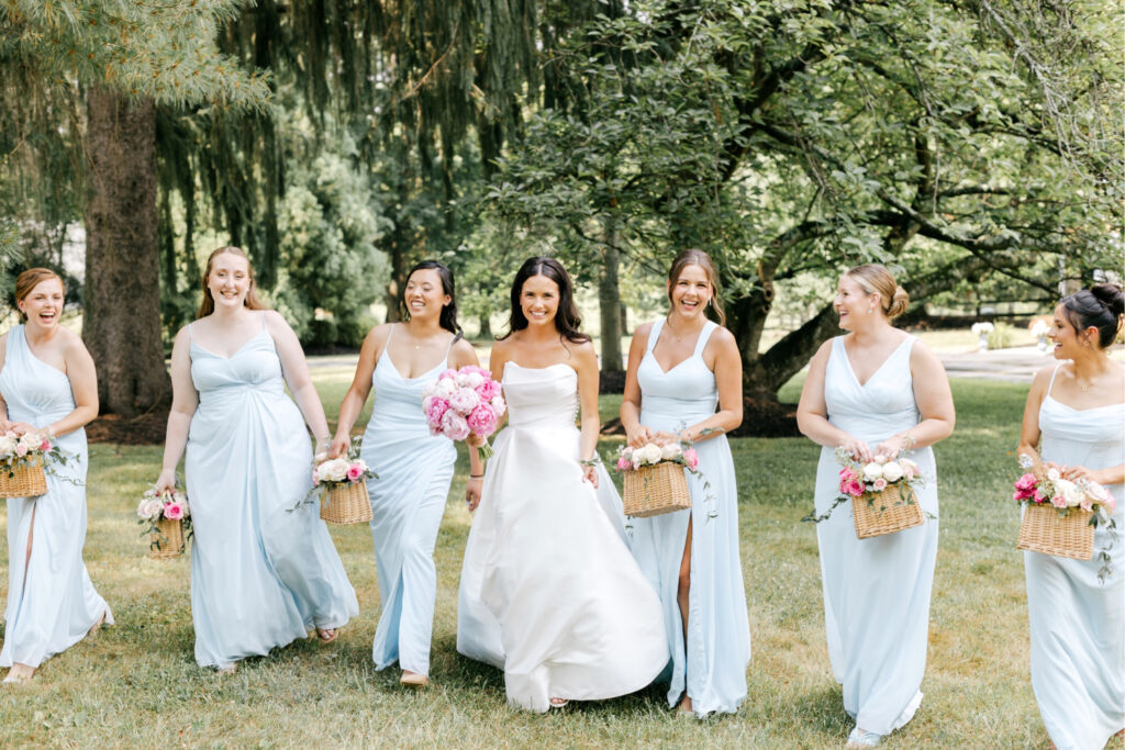 bride with bridesmaids in light blue bridesmaid dresses in Pennsylvania suburbs