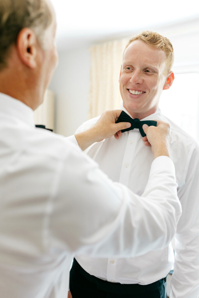 groom getting ready for his summer Pennsylvania wedding