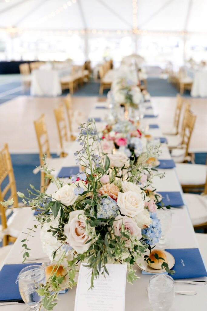 vibrant summer wedding reception floral decor