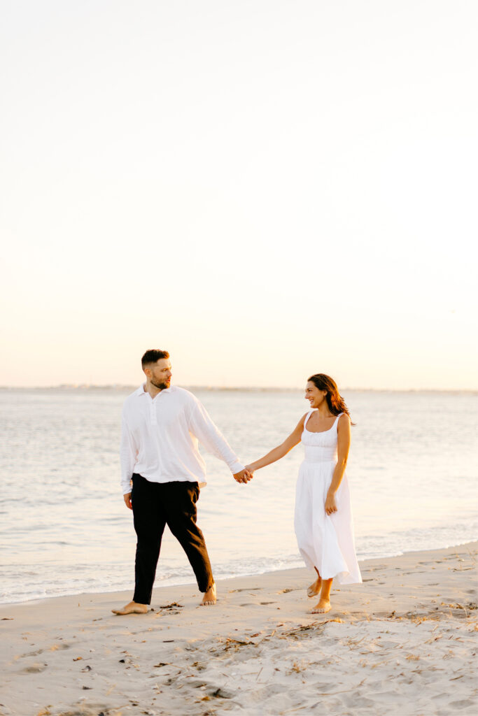 sunset engagement beach photoshoot by Emily Wren Photography