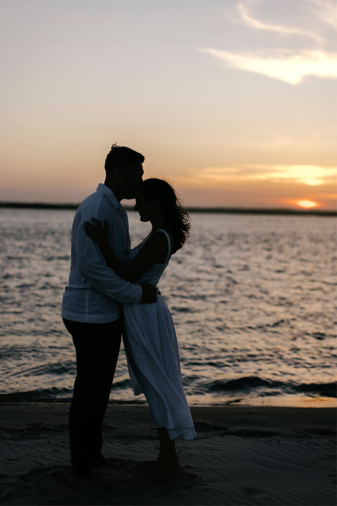 sunset beach engagement photos at Sea Isle, New Jersey by Emily Wren Photography