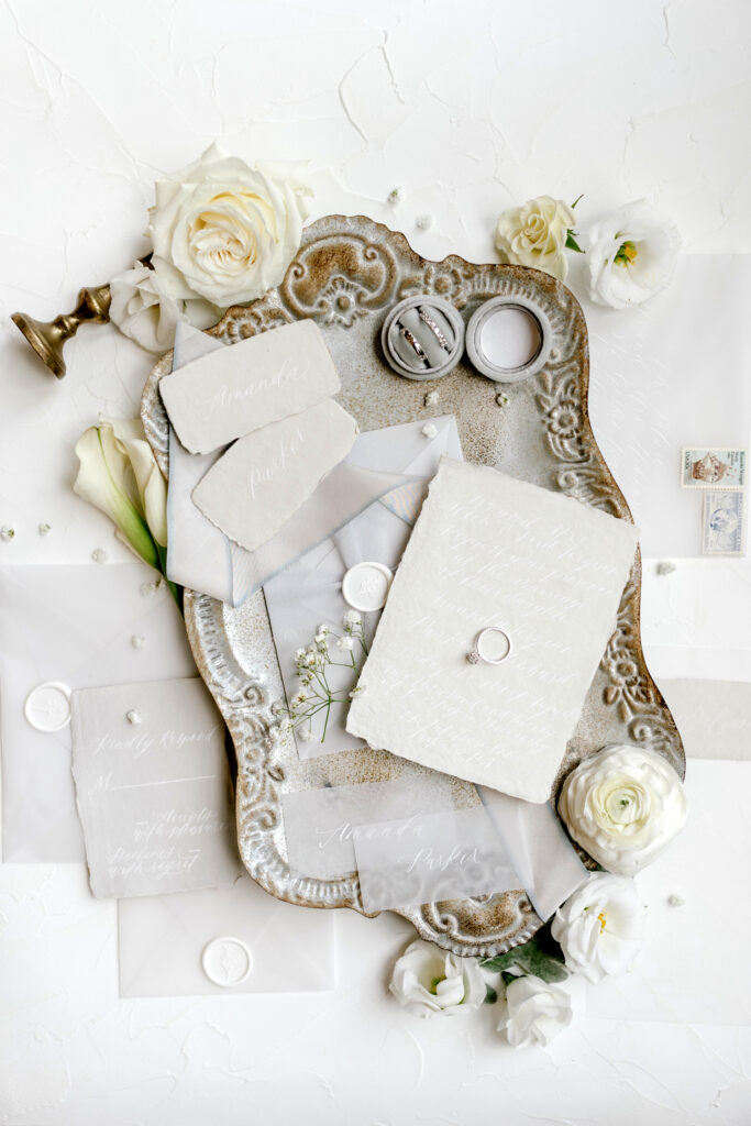 all white wedding invitational suite by Emily Wren Photography