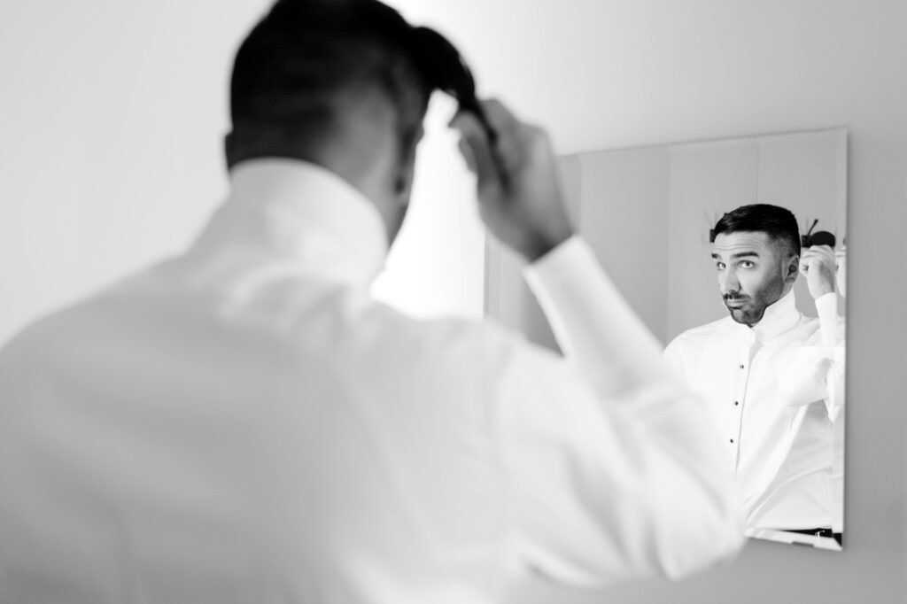 groom getting ready for his summer Pennsylvania wedding