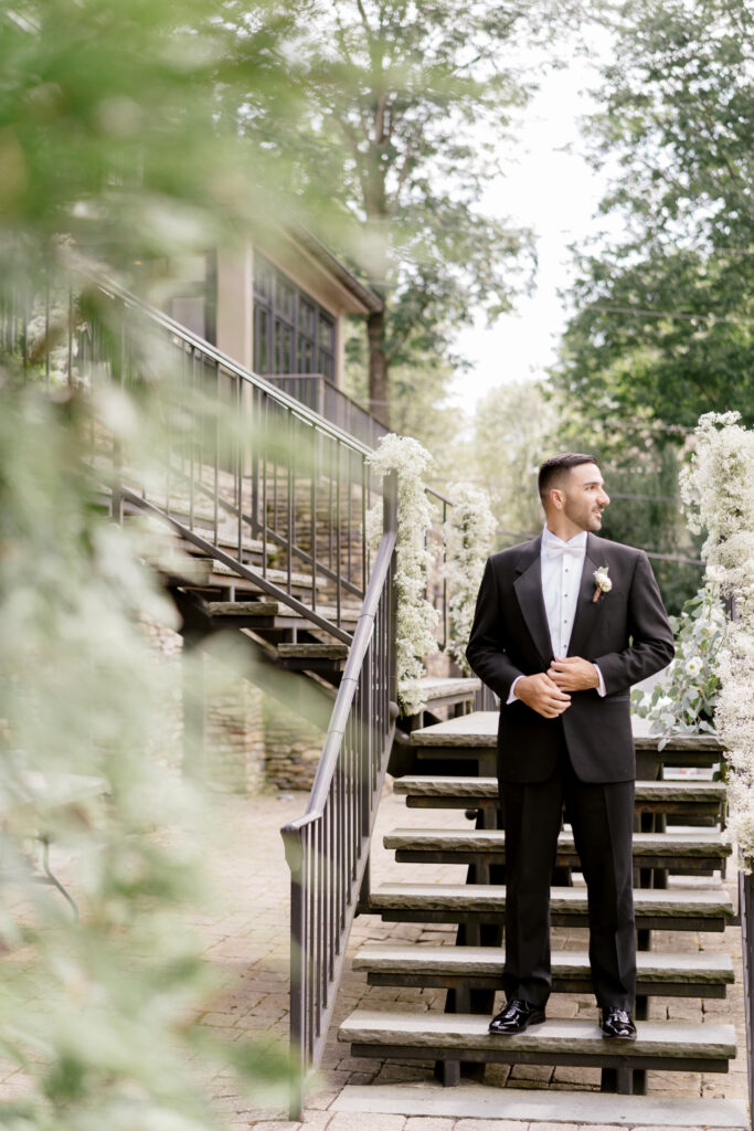 groom before his lakeside wedding by Emily Wren Photography