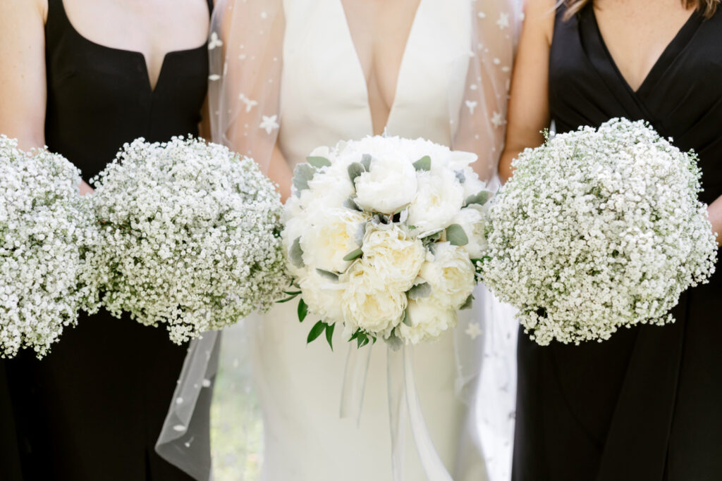 all white bridal bouquet and babies breath bridesmaid bouquets