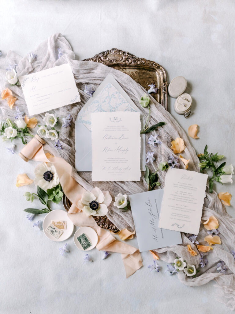 white and light blue wedding invitation suite by Emily Wren Photography