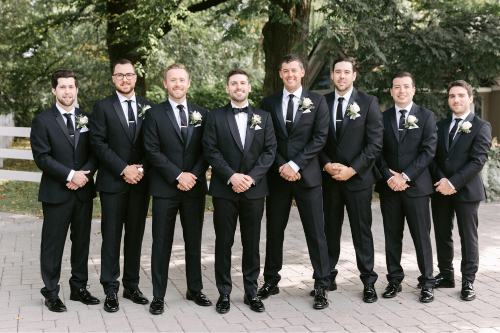 groom with his groomsmen by Emily Wren Photography