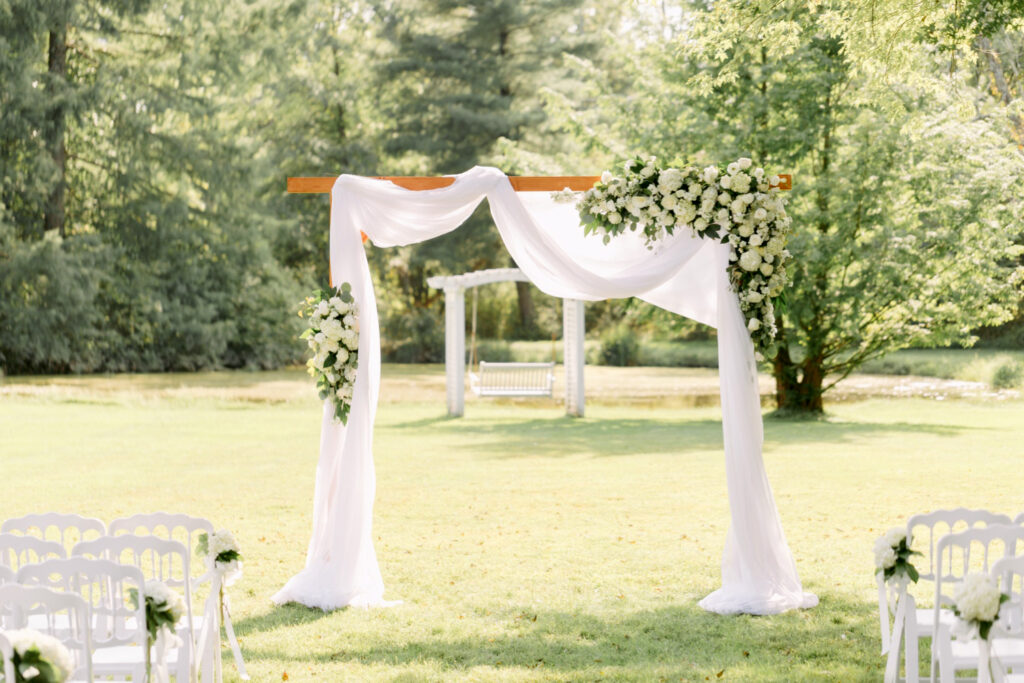 white linen wedding archway