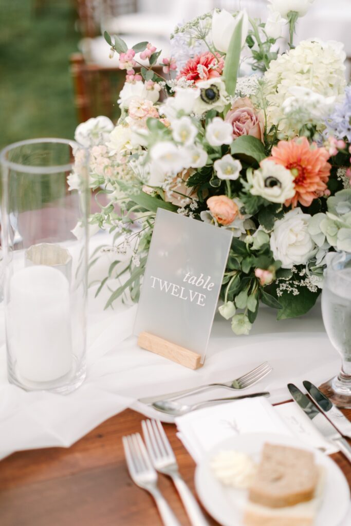 transparent table numbers for whimsical summer wedding