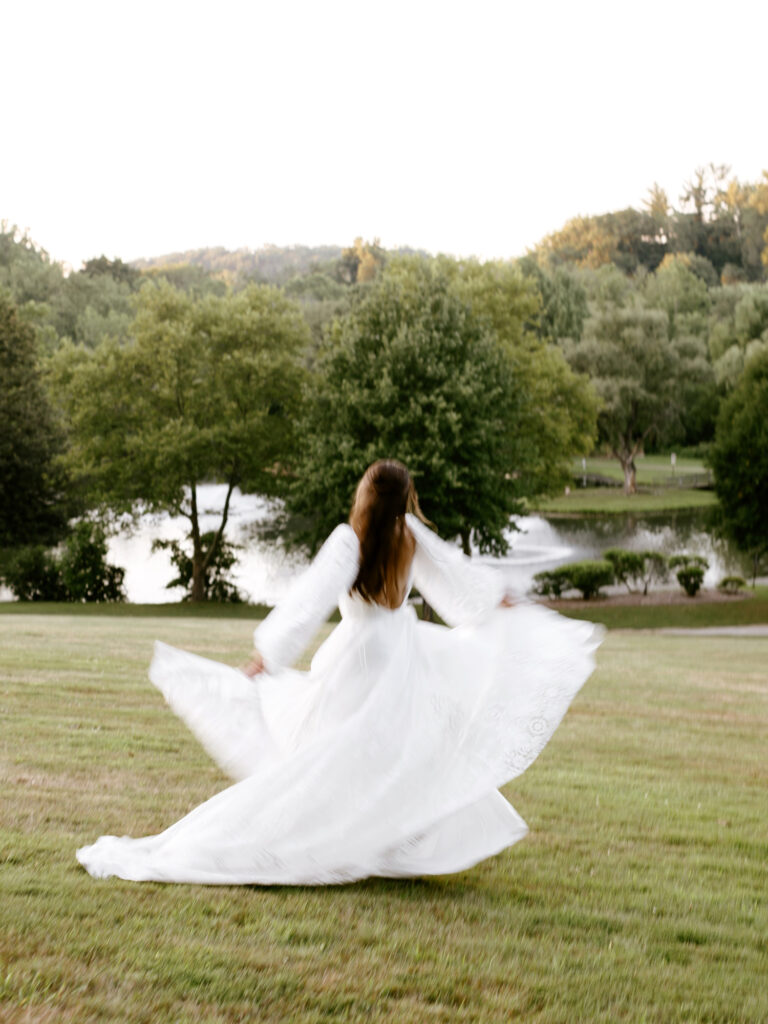 whimsical Philadelphia bride running through a field at The Willows by Emily Wren Photography