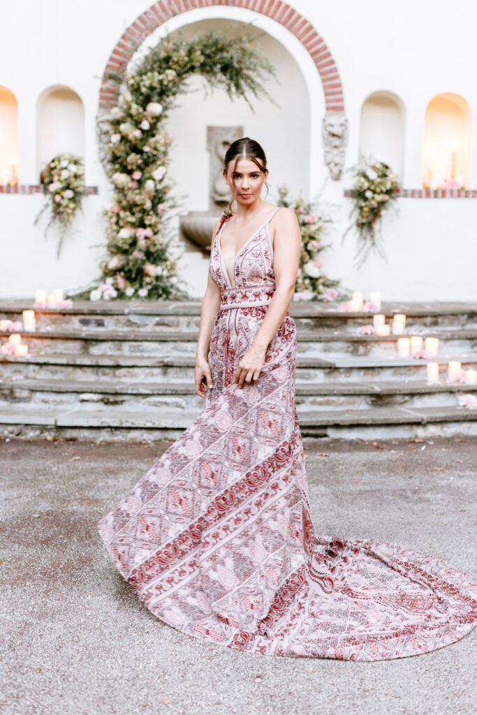 bohemian bride in colorful reception dress by Emily Wren Photography