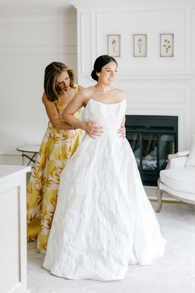 bride getting ready for her Delaware summer wedding day by Emily Wren Photography