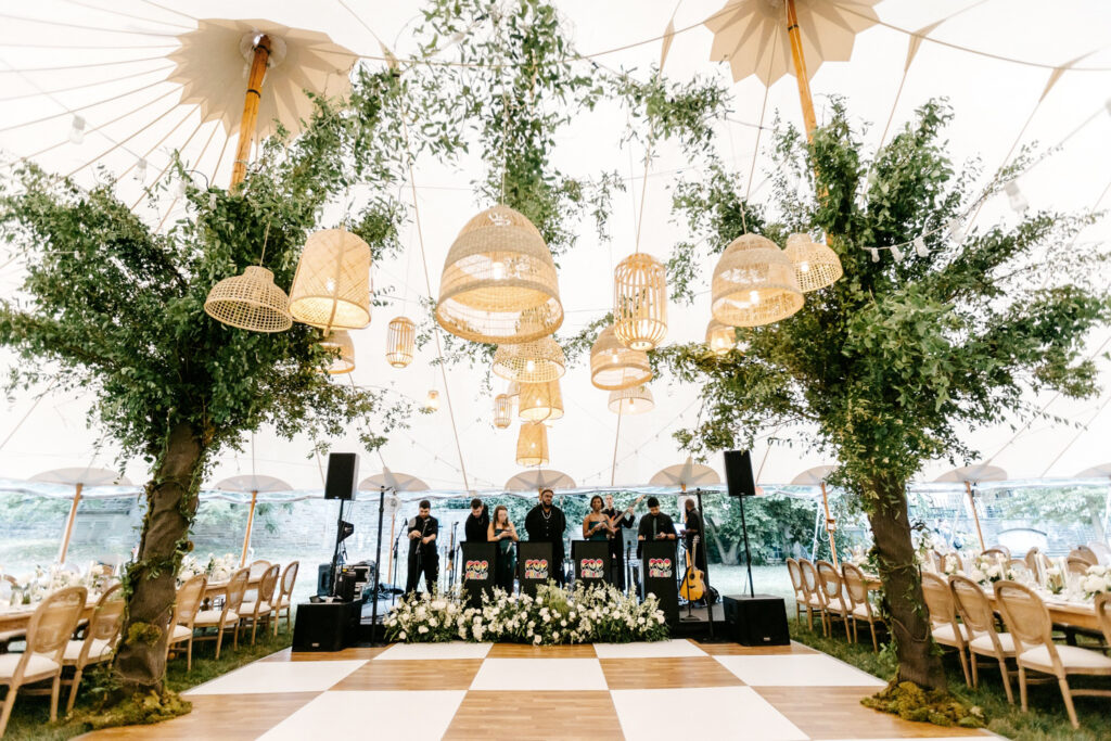 whimsical garden wedding reception with checkered dance floor