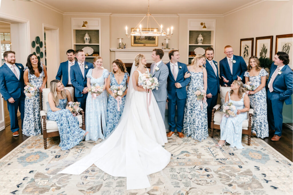 full wedding party in matching blue attire by Emily Wren Photography