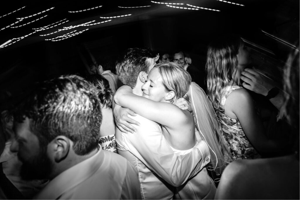 bride & groom dancing in crowd at their Philadelphia golf club wedding reception